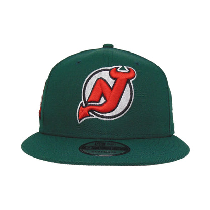 New Jersey Devils New Era 9FIFTY Snapback Cap Dark Green 25th dark green Front View